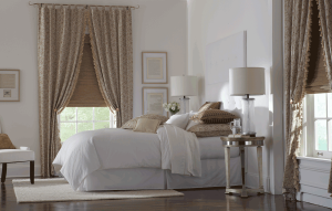 farmhouse window treatments fabric curtains layered with shades white bedding Overland Park