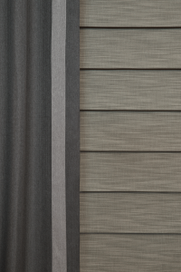 layering room darkening shades with side drapery panels Olathe KS