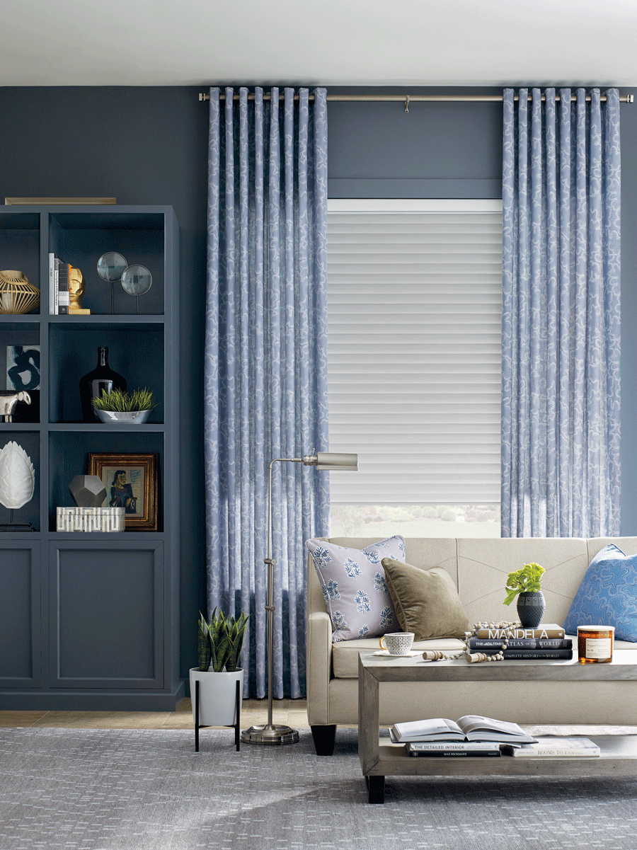 Create height in your room with window treatments up to the ceiling.