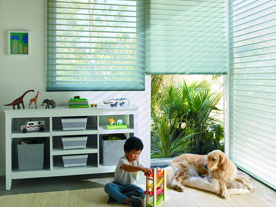 A playroom with Nantucket™ Window Shadings with LiteRise®.