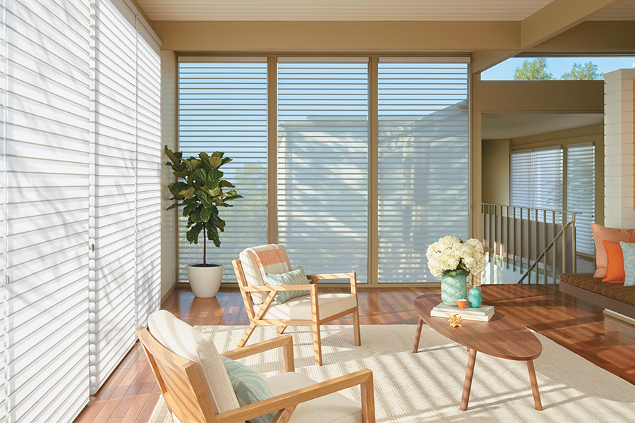 Nantucket sheet shades in a living room.