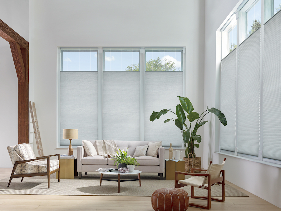 Cellular shades in living room for added energy efficiency.