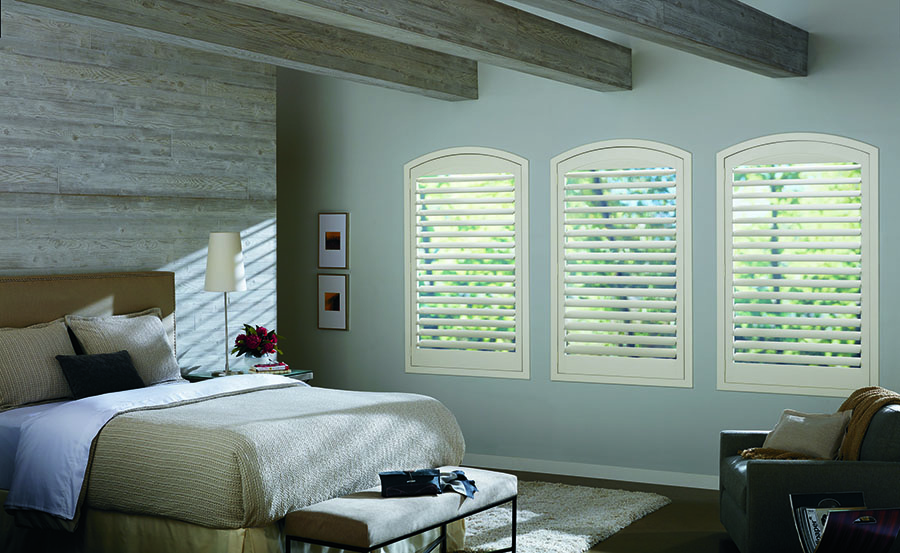 NewStyle® Hybrid Shutters in a bedroom