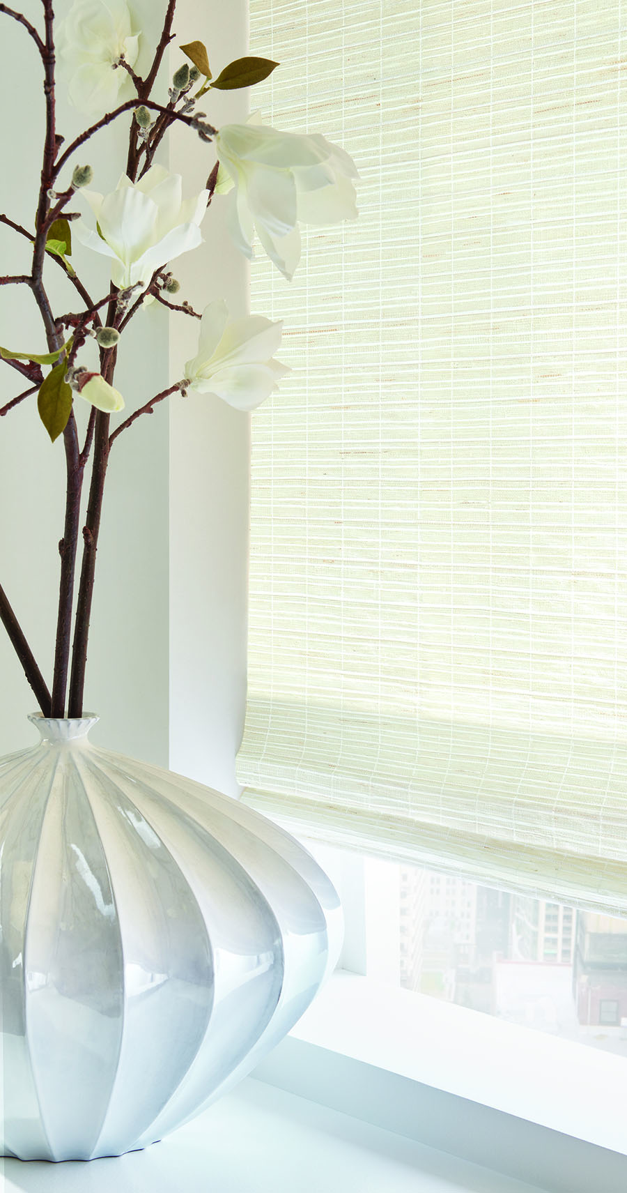 White woven shades add texture.