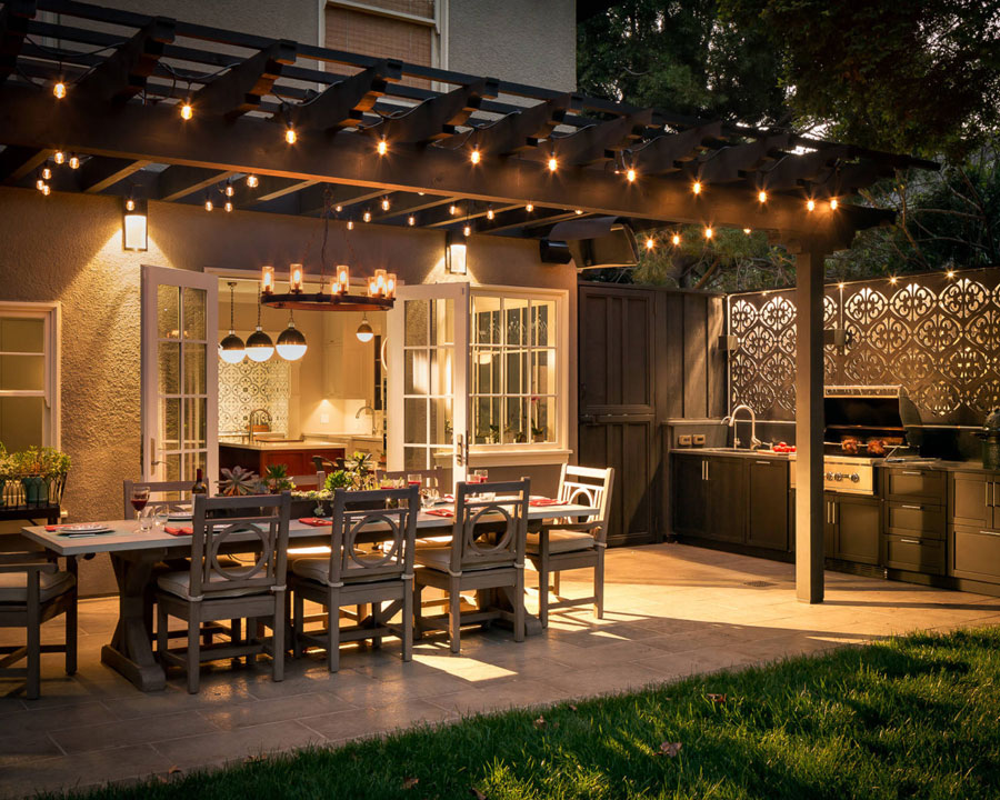 Outdoor patio area with dinner table.