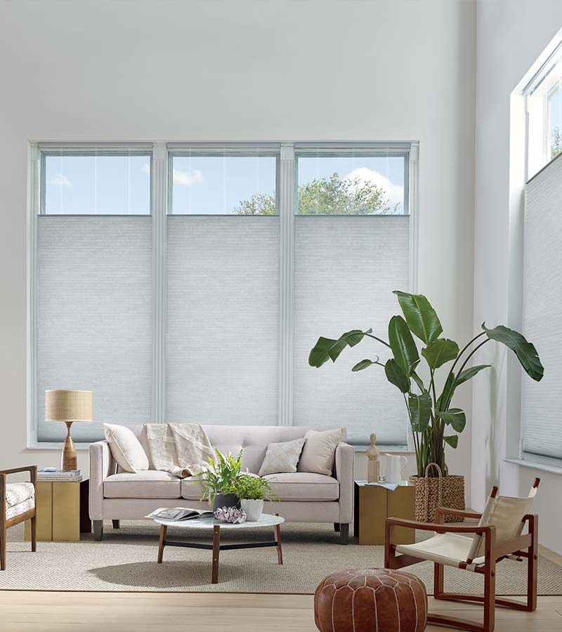 top down honeycomb shades in living room with high ceilings in Olathe 66062