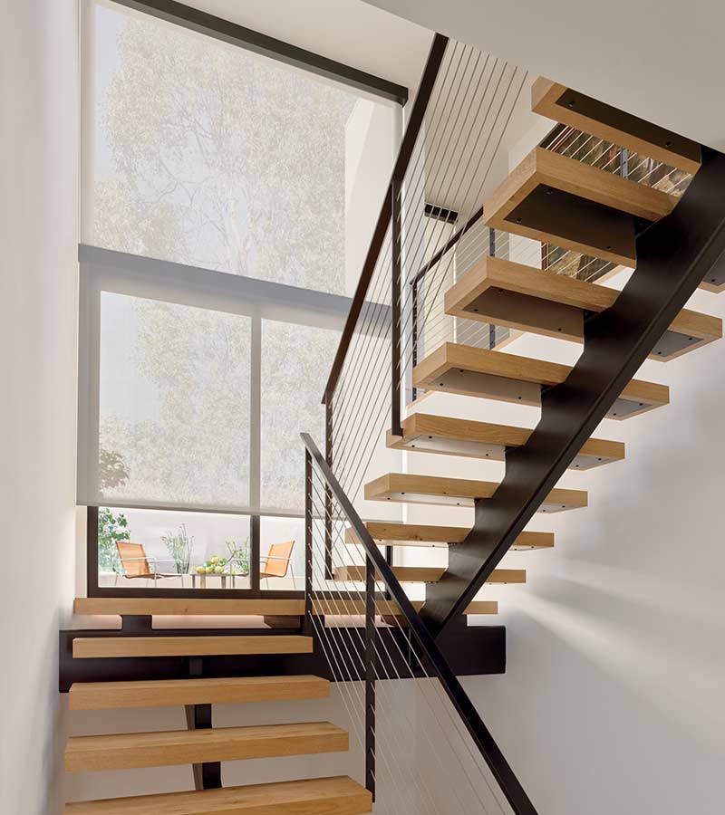 modern staircase with white screen shades in Overland Park KS