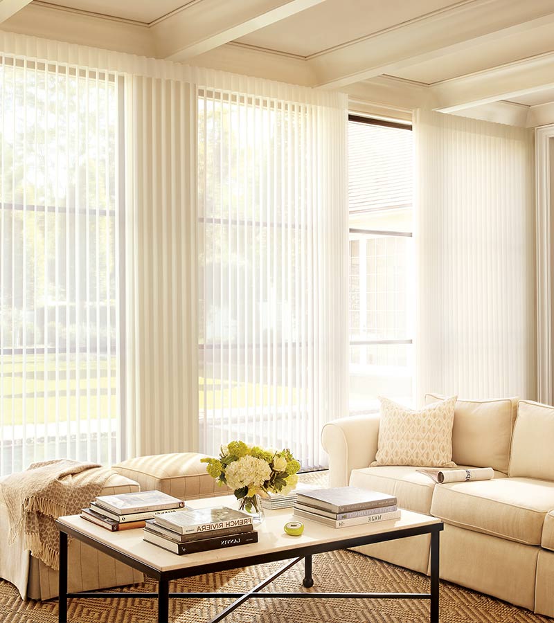 traditional beige living room with floor to ceiling privacy shades in Olathe KS