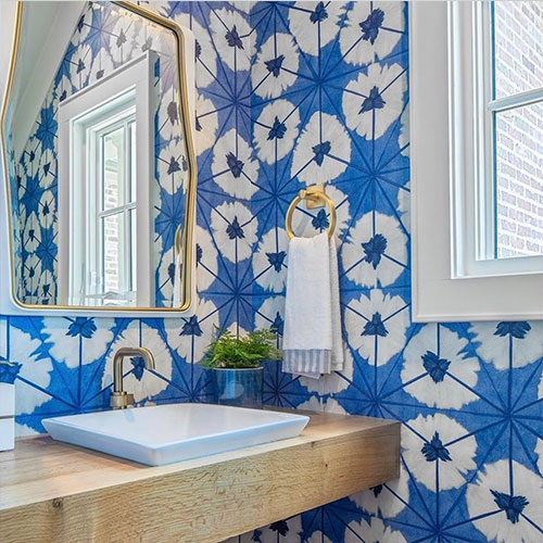 blue and white floral wallpaper in unique bathroom