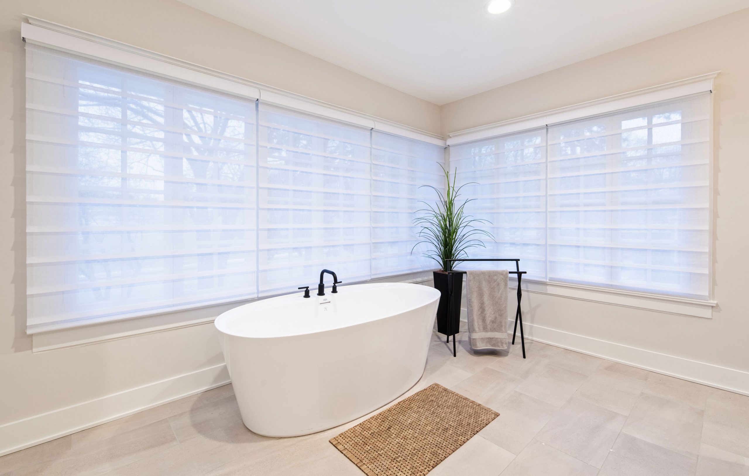 large bathroom with standing tub