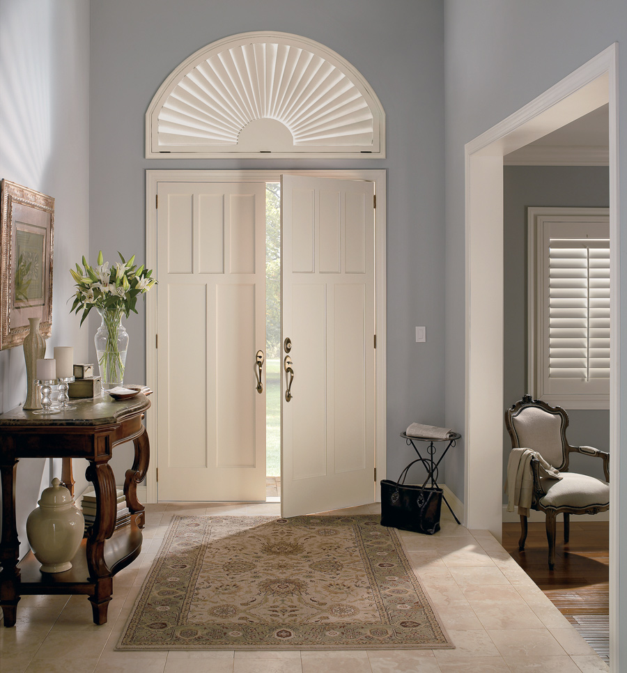 Entryway door with shutters in Kansas city home