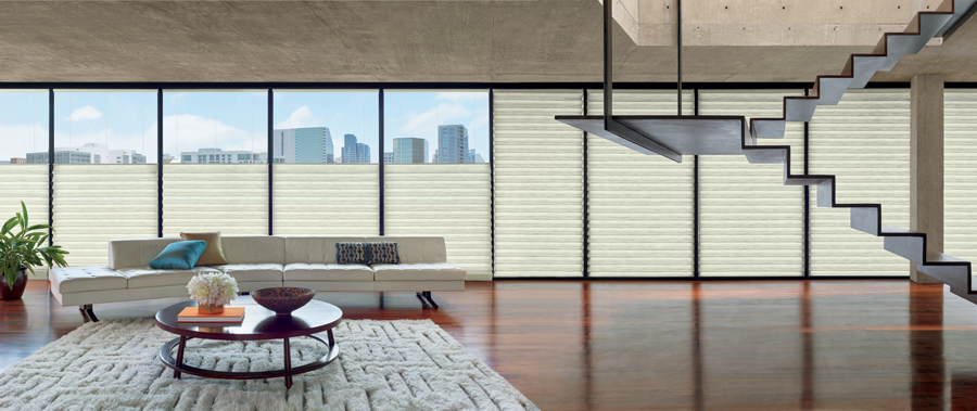 floor to ceiling windows in condo in downtown Kansas City with top down roman shades