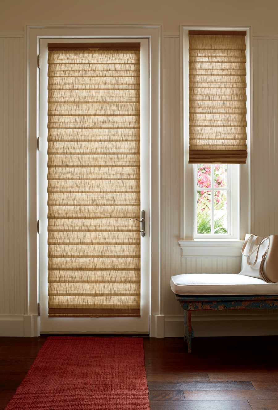 roman shades on the entryway door and sidelight of Oalthe KS home