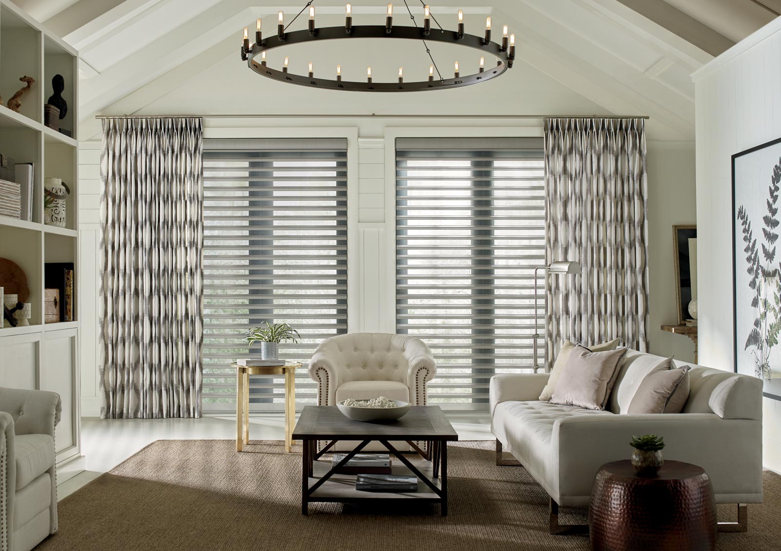 pirouette shades act as a dimmer switch for lighting with motorized draperies