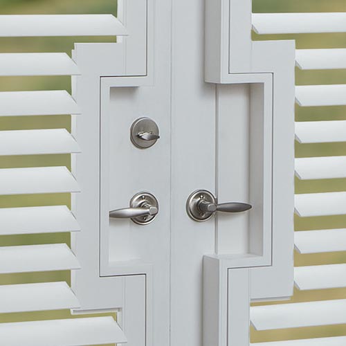 french doors with handle cutouts when covered with shutters