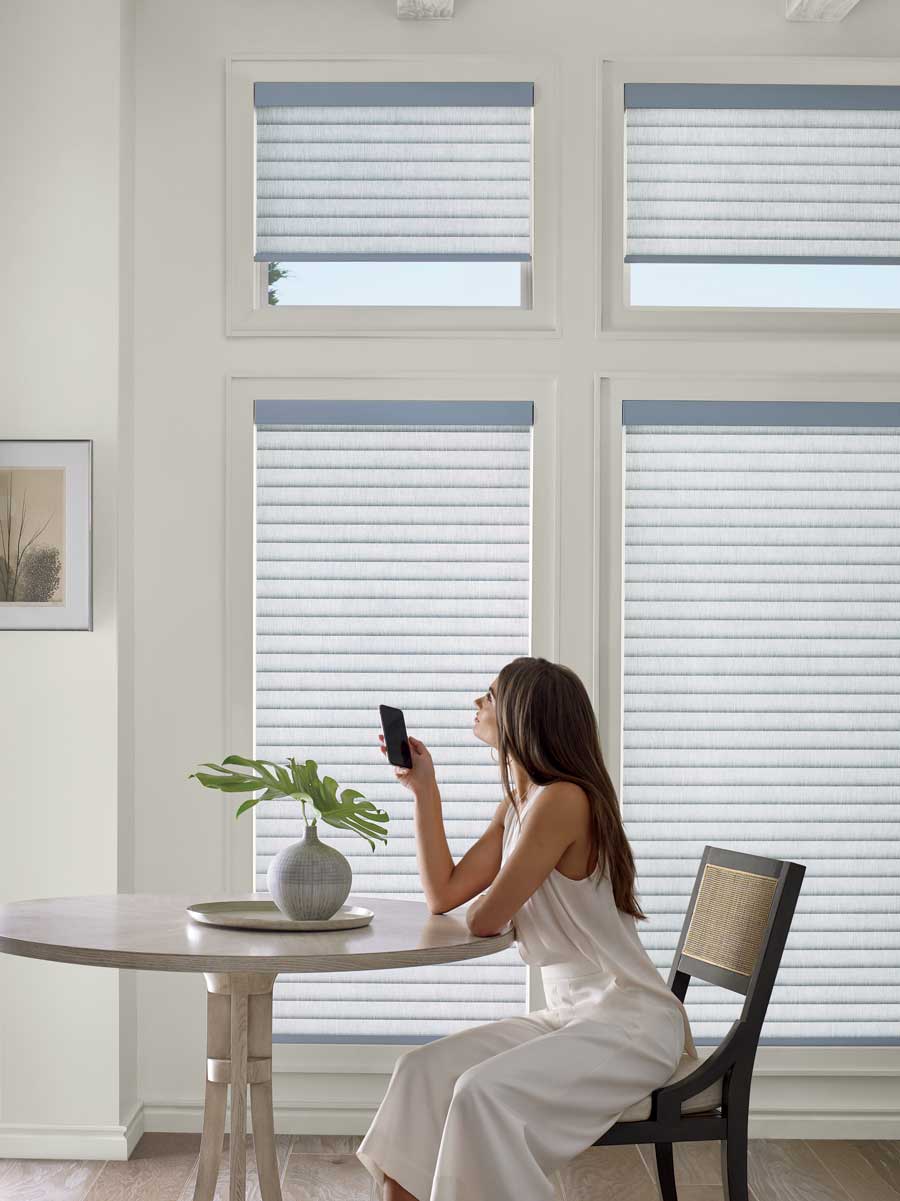 Airy open room with sonnette cellular roller shades