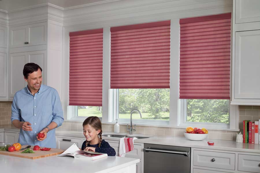 Viva magenta shades in white kitchen