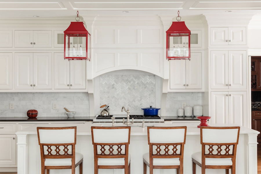 Red lantern pendants above kitchen island