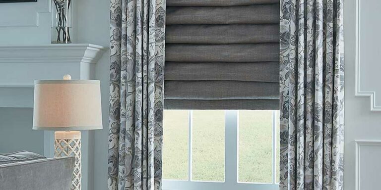 layered fabrics at the window with drapery and roman shades in Kansas City