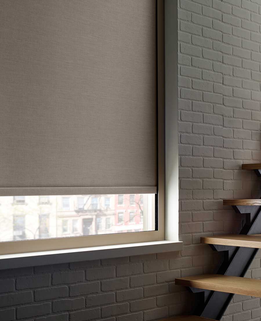 Modern staircase with an exterior facing window with Designer Roller Shades