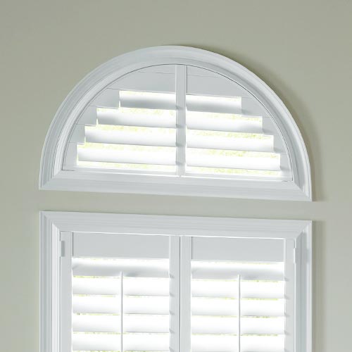 white shutters on arched window